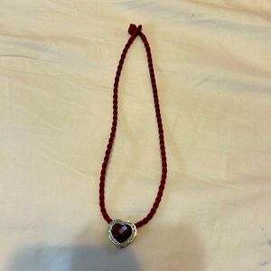 Heart necklace on red rope chain